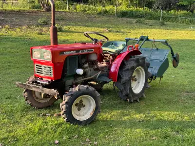 Well cared for Yanmar diesel tractor with tiller, blade, and forks. 4x4 or 2x4 3 gears and reverse H...