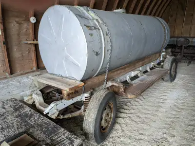 Custom built 1000 gallon tank on one ton truck frame.
