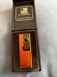Rare WIN INTERNATIONAL Lighter