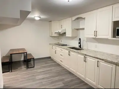 This is one basement room available for lease with a separate entrance, offering a cozy living space...