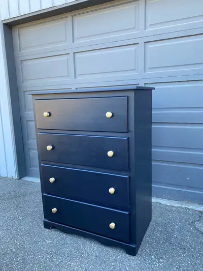 4-drawer wooden dresser – classy look. Sturdy, clean, and ready to use. Adds style and storage to an...