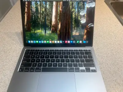 This Apple MacBook Air is in excellent condition, a late 2020 model featuring the powerful Apple M1...