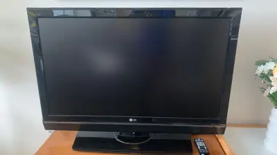 LG 42" TV with remote, View more