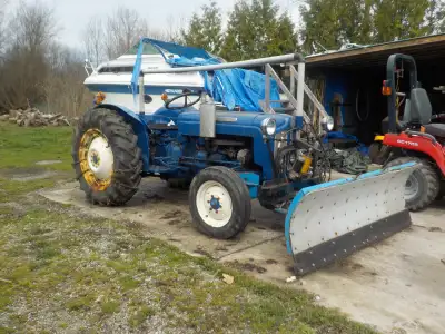 Ford Dexta Tractor, all good tires with chains, power angling snowplow, rear 7 ft. grader blade, 6 f...