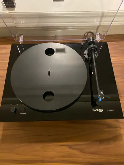 Selling my thorens TD 295 MK 4 semi automatic turntable. Works great, maybe 20 hours on it. Some rec...