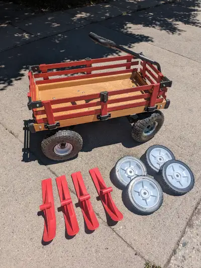 Millside Industries wood wagon with pneumatic (air) tires. Also comes with a new set of solid plasti...