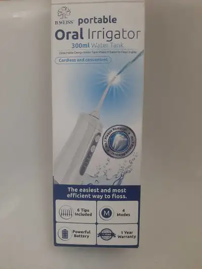 Découvrez l'irrigateur oral portable B.Weiss, un outil efficace pour nettoyer les dents en profondeu...