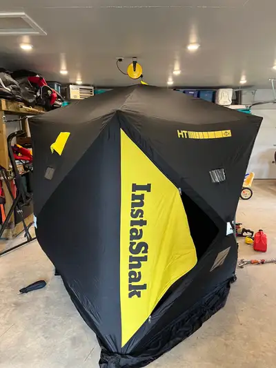 Used Instashack ice fishing pop up shelter, View more