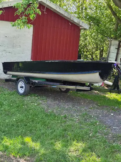 Trailer was just painted black new lights new trialer jack. 6hp evinrude runs good with tank aluminu...