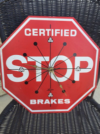 Gas/Oil Stop Sign clock. 306-717-9678 