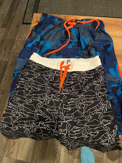 Kids clothes size 14-16.. swimming shorts and tshirts