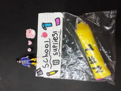 1 squishy 3 charms, and a Lego girl from a kinder egg surprise, View more
