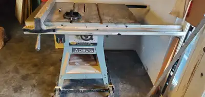 Delta 200 cast iron table saw,good condition $400 OBO, Mortise and tenon jig jig available ( busy be...