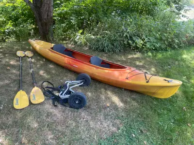 Two person kayak, with two paddles, and cart. Doesn’t get used anymore, so looking for a new home. A...