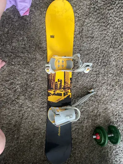 Used snowboard, 151cm, bottom straps on bindings are cut pretty short bud rides great!