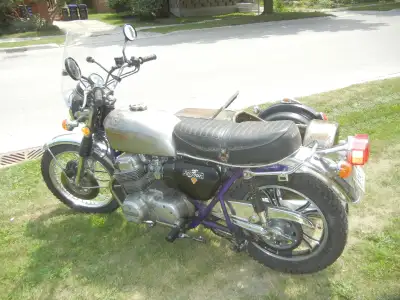 1 CB750 in pieces, mostly complete. The other CB750 starts easily and runs fine with a side car for...