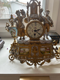 French clock with vases