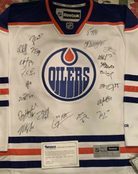 2011/12 Oilers team signed jersey with COA 