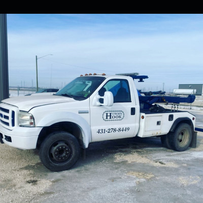 24/7 towing and boosting 