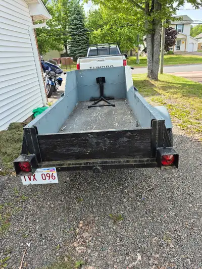 Tilt load utility trailer! Also comes with wheel lock for smaller model motorcycles and dirt bikes....