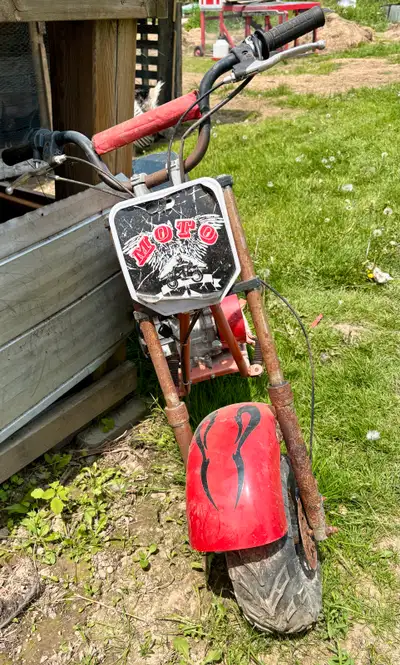Rev up your engines for this vintage Little Motor Bike! While it shows its age with some rust, this...