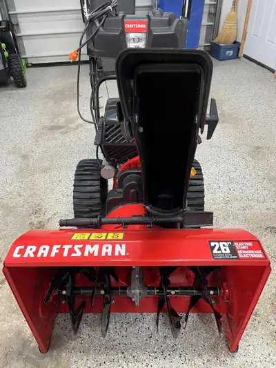 LIKE NEW The CRAFTSMAN 26 blower is powered by a 243 cc 4-cycle OHV engine. Its push-button electric...