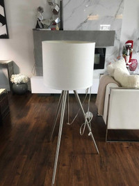 White and silver Floor lamp with step on button to turn on /off