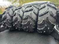 Like new 28 in. Maxxis Zilla tires for 14 inch rim.