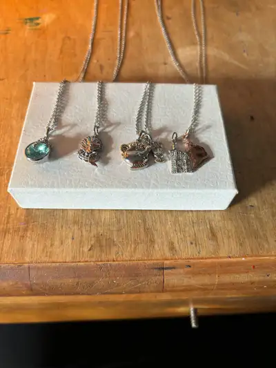 Selling 4 different Disney Charmed Aroma Necklaces, the necklaces are Ariel, Ms.Pots&Chip, Cinderell...