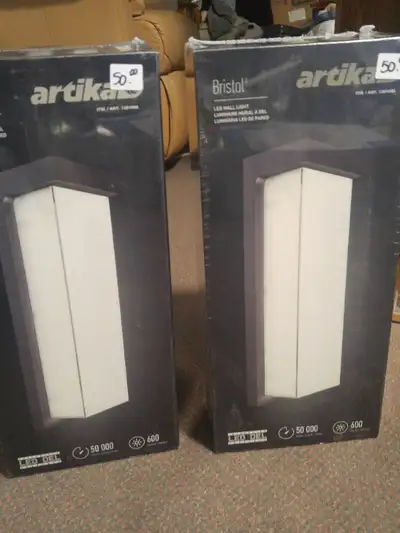 These Artika Bristol Skeet Integrated LED Outdoor Wall Lights are brand new, still sealed in boxes....