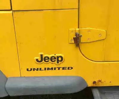 I am selling a 2004 Jeep Wrangler Unlimited, known as the 'Long Jeep,' with its distinctive extended...