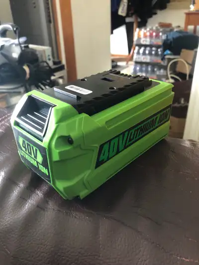 This is a new Abatinvo 40-volt 6.5 AH battery and charger, perfect for your Greenworks tools. It's i...