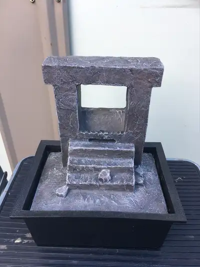 TABLE TOP FOUNTAIN - STEPS. NEW. EXCELLENT CONDITION. 10” X H = 6” X W = 10” X L. NEED ADAPTER TO WO...