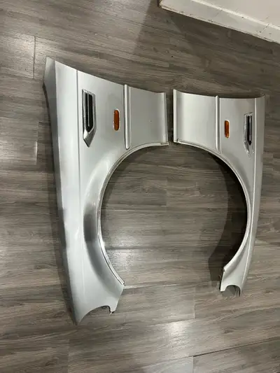 $225 OBO These pre-owned BMW E46 3 Series 2-door front fenders are finished in silver and come compl...