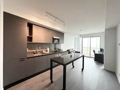 MODERN 2+DEN CONDO WITH STUNNING CITY AND CONSERVATION VIEWS
