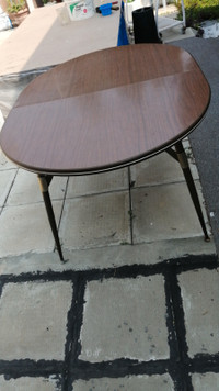 Oval-shape wood dinning table  (photo)