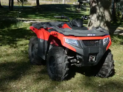 Carburetor is updated from Manual to Automatic choke. Tires are upgraded to Mud Lite (ITP) 26x9.00-1...