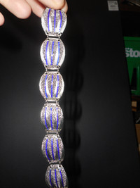 Sterling Silver bracelet with blue enamel accents,  NEVER  worn