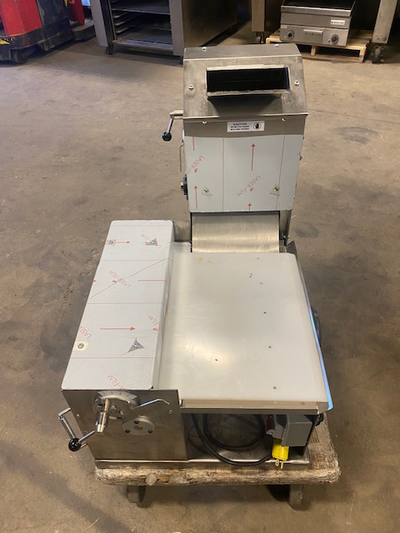 You are viewing a nicely used bakery 18" dough sheeter double pass through. This Universe TM-18 Elec...