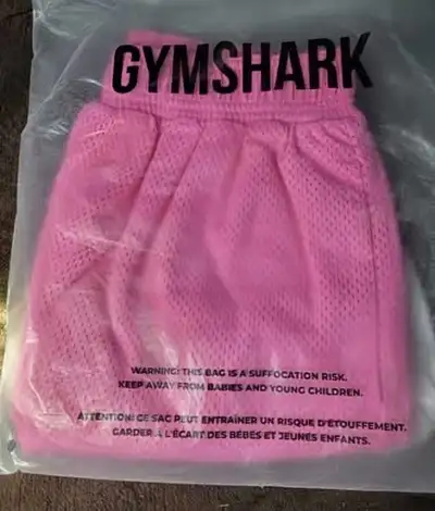 Pink Gymshark mesh shorts (Size S), View more