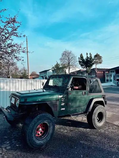 2000 jeep tj. Lifted. 5 speed. Comes with bunch of extra parts etc. Looking to trade for a small tru...