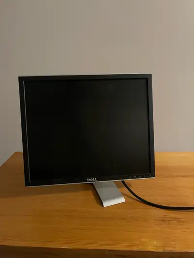 This is a used Dell 17-inch LCD monitor. It has a clear display and is in good working condition.