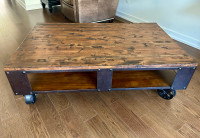 Solid wood coffee table on wheels 