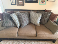 Sofa with blue and brown cushions