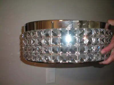 New and like new crystal lamp-$20, crystal ceiling light( USA) $40, new lighting-$20, etc. Free deli...