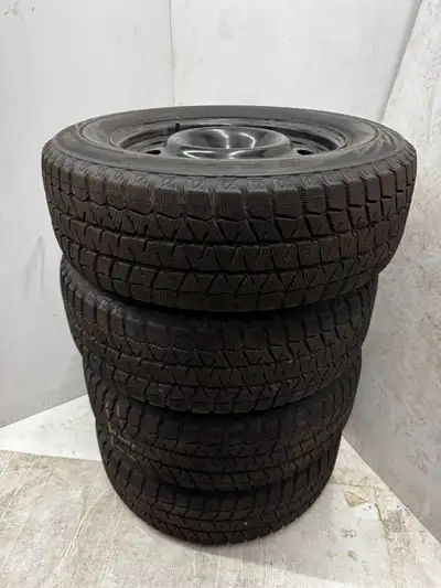 Have 4 tires and rims off a 2022 Ford Escape, Bridgestone Blizzak winter tires with steel rims. Tire...