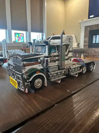 Australian Kenworth T909 model truck with a Drake Trailers 4x8 Float and 2x8 Dolly. This is the Memb...