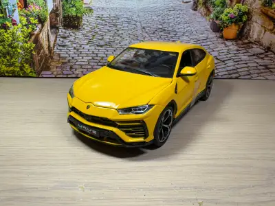 Selling a Maisto Special Edition 1:18 scale Lamborghini Urus in striking yellow. Brand new, factory...