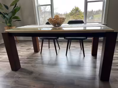 Marble with glass top dinning room table in good condition. Dimensions: 38" x 66" x 30"high. Five wo...