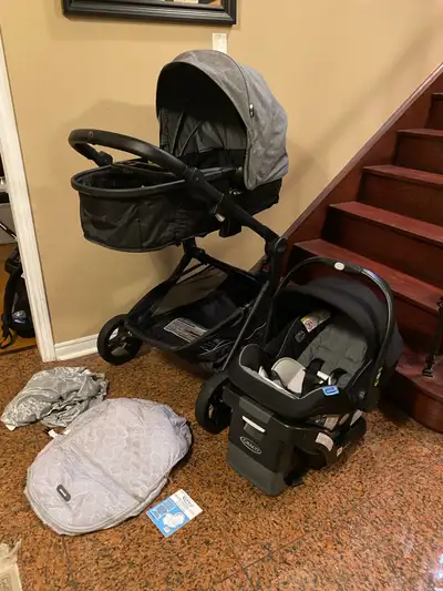 Selling a Graco 5-in-1 stroller with car seat, designed to grow with your child from infancy through...